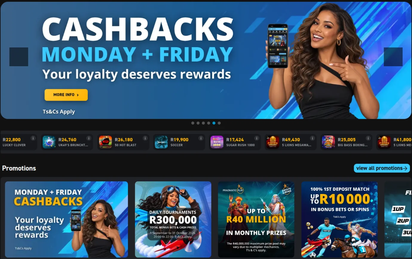 FirstBet homepage with a Monday and Friday cashbacks banner, a jackpot strip, and promotion tiles for daily Aviator tournaments, Pragmatic Play prize drops and the 100% first deposit match up to R10,000 in bonus bets or spins